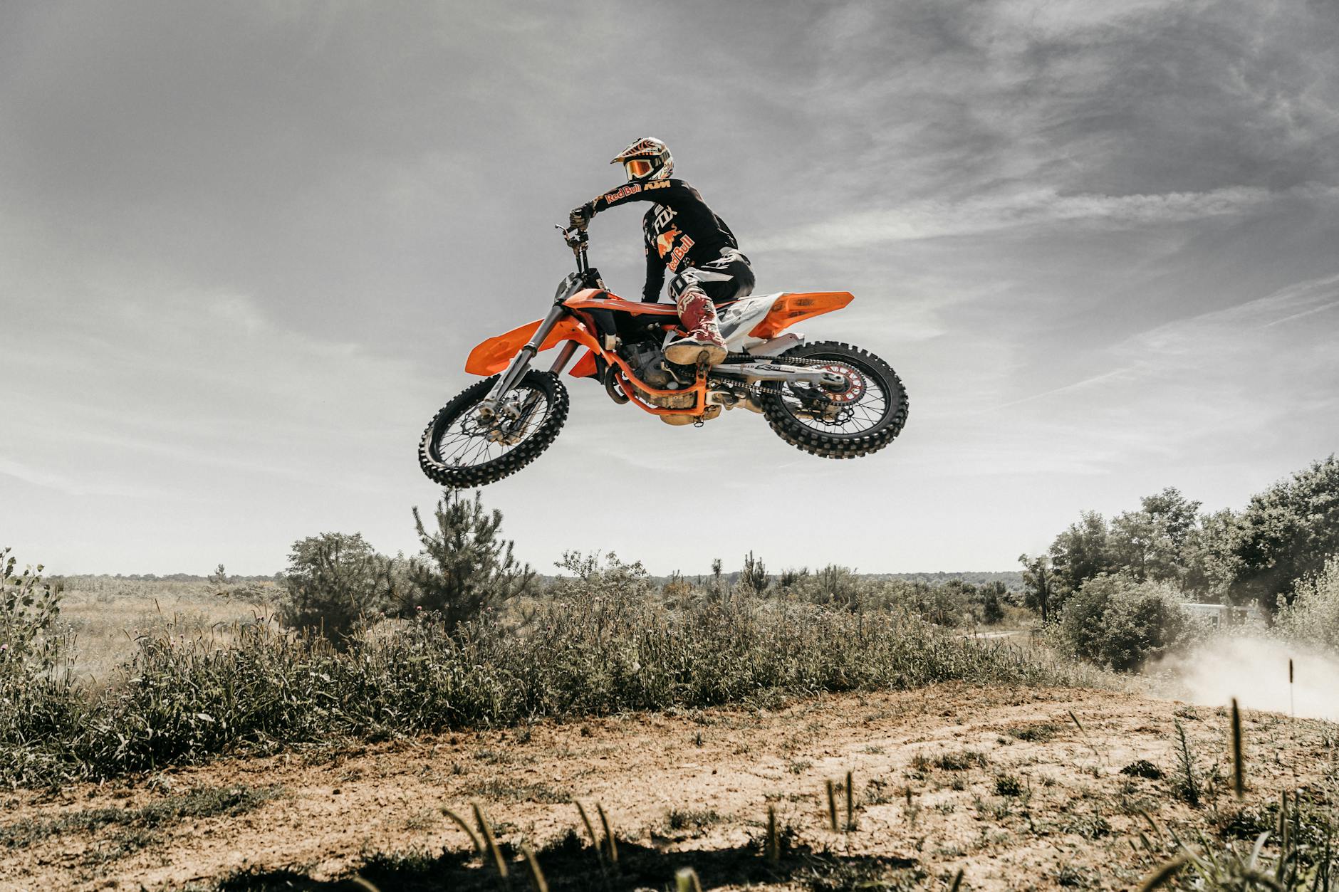 a person jumping on a motocross bike